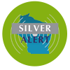 blue icon of state of Wisconsin with grey sound wave lines making Silver Alert logo